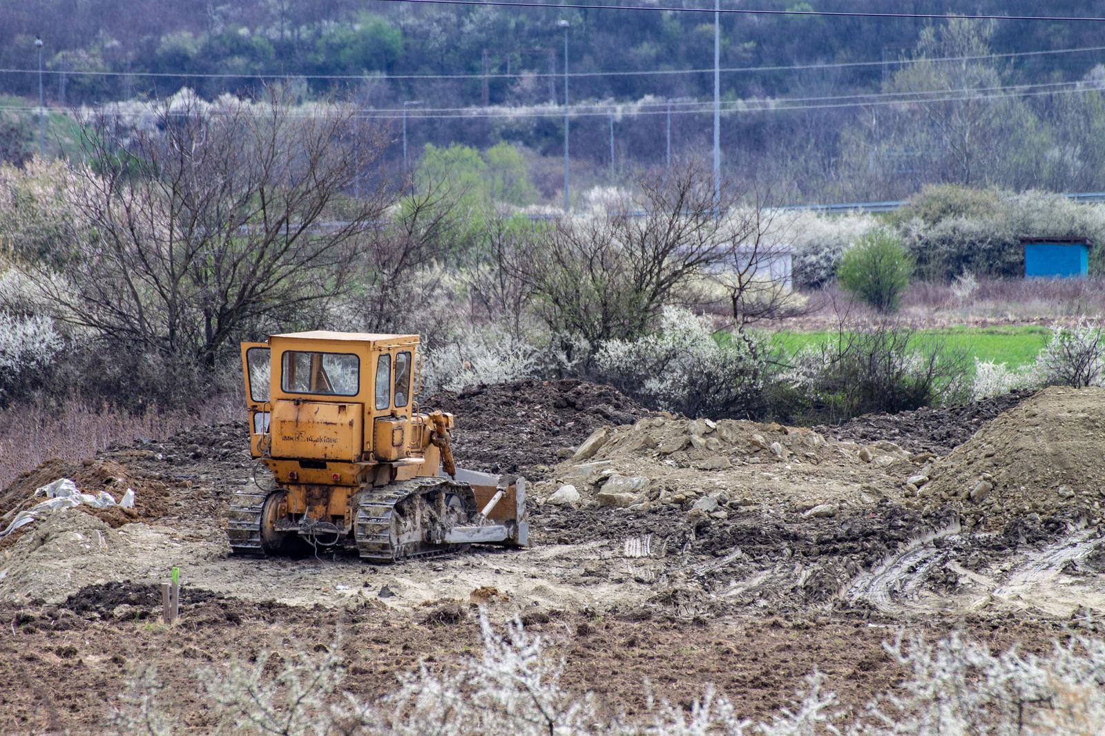 Land clearing equipment clearing a lot